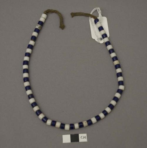 Necklace, blue & white discoidal glass beads on brown cloth cord