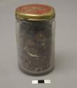 Ground up seeds - part of the equipment used in making of the poison used on the
