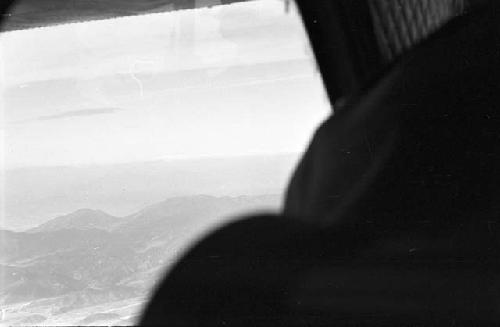 View of mountains from plane window