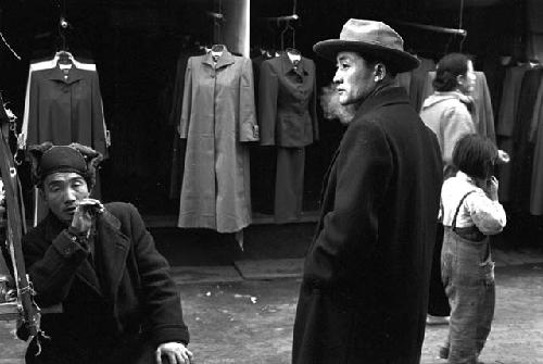 Portrait of men smoking in the marketplace