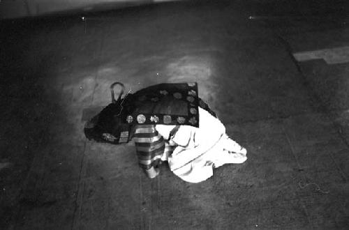 Portrait of dressed up child kneeling on floor