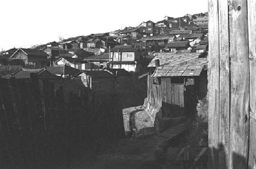 View of homes rising on the hill