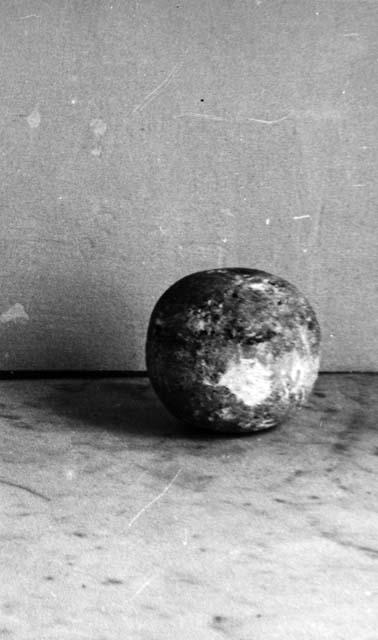 Limestone sphere with depression