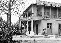 Merida office from north with caretaker Eduardo Toro Q. leaning against house