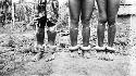 Three women wearing anklets