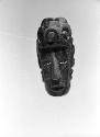 Fragment of bead or pendant, human head