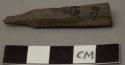 Fragment of charred worked bone