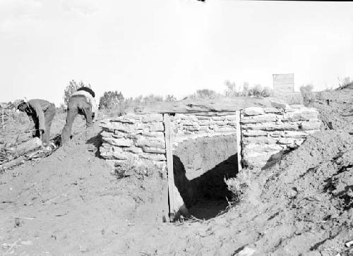 Al Lancaster building storage cellar, 1936