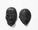 Two wooden masks