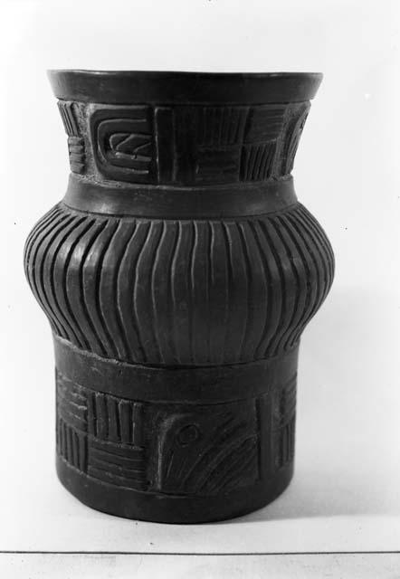 Carved pottery vase