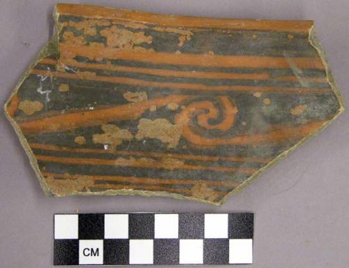 Black on red sherd with wave and spiral patterns