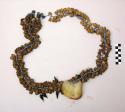 Bead and seed necklace with feathers in front (shasha)