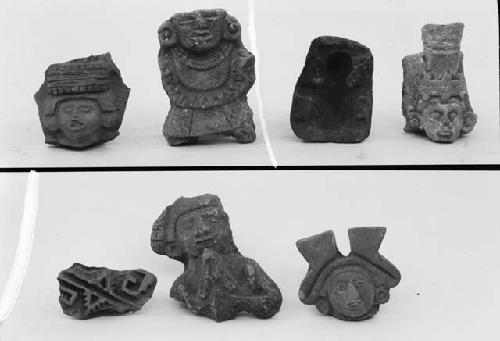 Group of figurines and a stamp