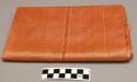 Fabric for man's longyi; orange ikat