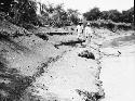 Men walking along riverbank at Cocle