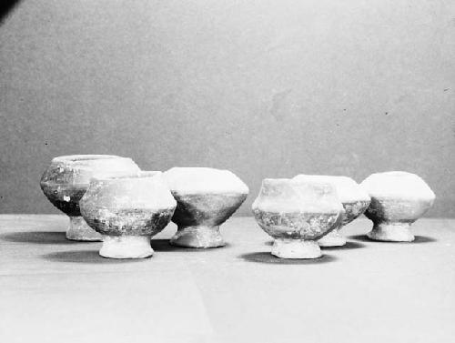 Miniature smoked ware jars with flaring bases, Grave 5