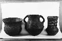 Three ceramic vessels, beakers or pitchers