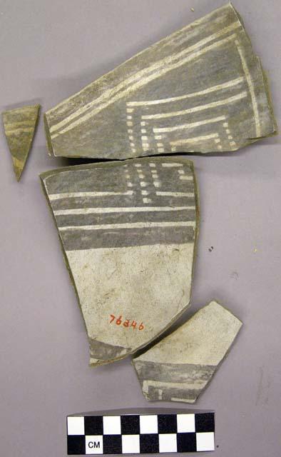 Black on white sherd with geometric pattern