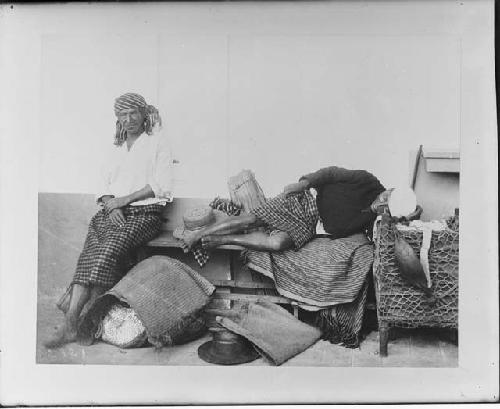 Indian man and woman with travelling equipment