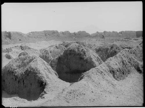 Remains of houses of Tschudi group. Background is northwest wall