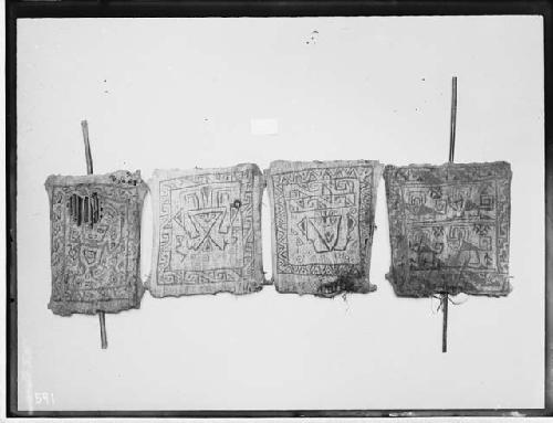 Cloth Tablets displayed on wall