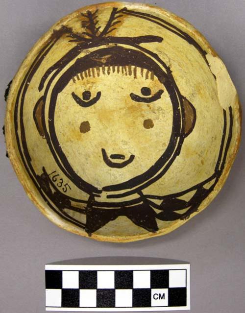 Bowl, polacca polychrome style c. int: clown design; ext: slipped, no design. 4.