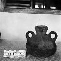 Small Pottery Jar with Face on Neck of Vessel