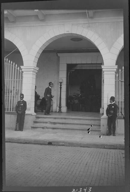 Guards in front of building