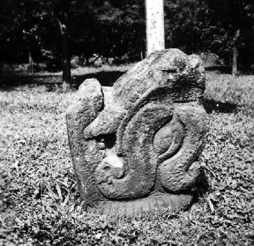 Sculptured stone serpent head