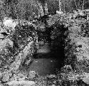 Vault  under east bench of Str. J-49-b