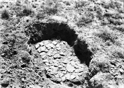 Rock platform, west side of plaza, east house