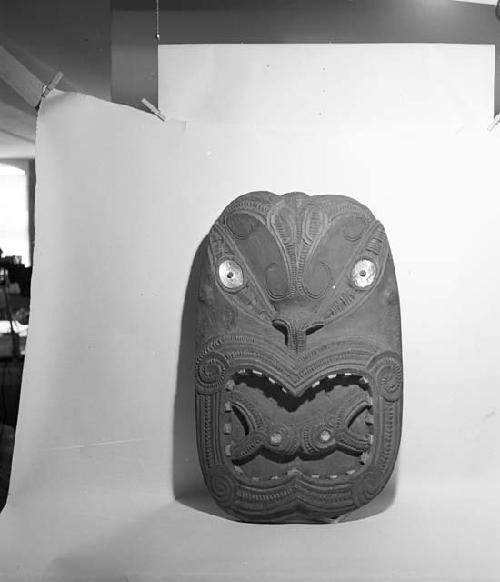 Large carved wooden head  used at top of entrance of the meetinghouse