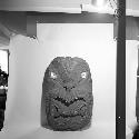 Large carved wooden head  used at top of entrance of the meetinghouse