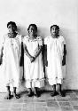 Maid, cook, & cook's ass't at Carnegie field quarters, 1952 Mayapan Project