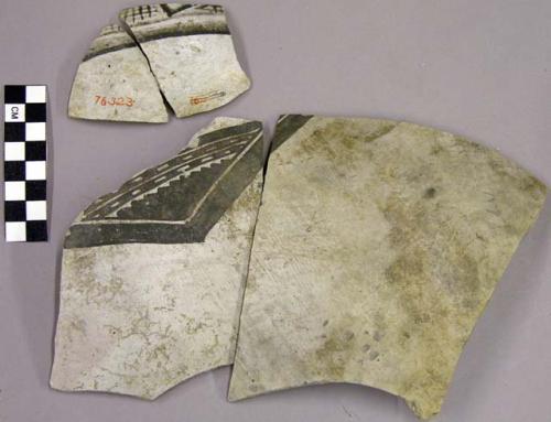 Black on white sherds from two vessels with exterior geometric designs