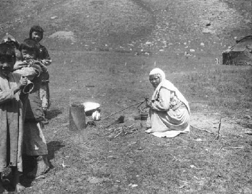 Kazak woman cooking