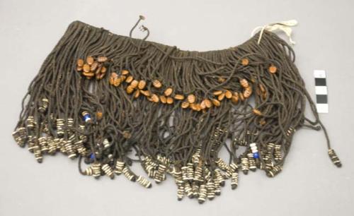 Two vegetable fiber cords(fragments)  from Woman's headdress 8847