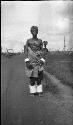 Chief's wife with ivory anklets and bracelets