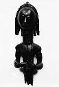 Male God figurine with child