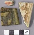 Polychrome rimsherds with geometric and curvilinear designs
