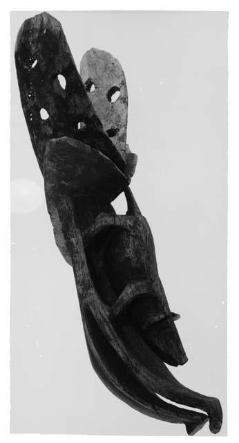 Carved wooden canoe figure head