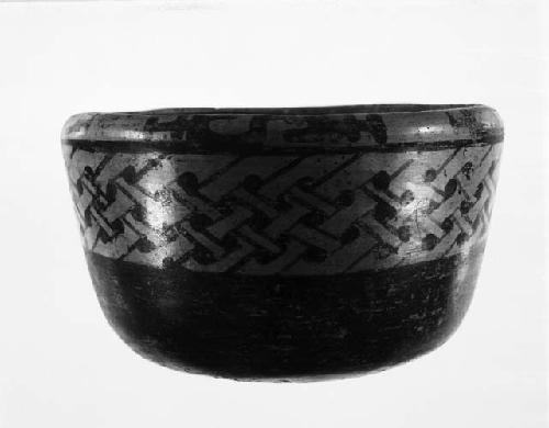 Yojoa polychrome pottery bowl, dimpled base and band of textile design