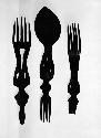 2 wooden forks (TU-I) and combination spoon and fork with figure of a glutton