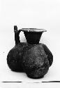 Three lobed jar, spout handle, smoked ware from Grave 15, number 96