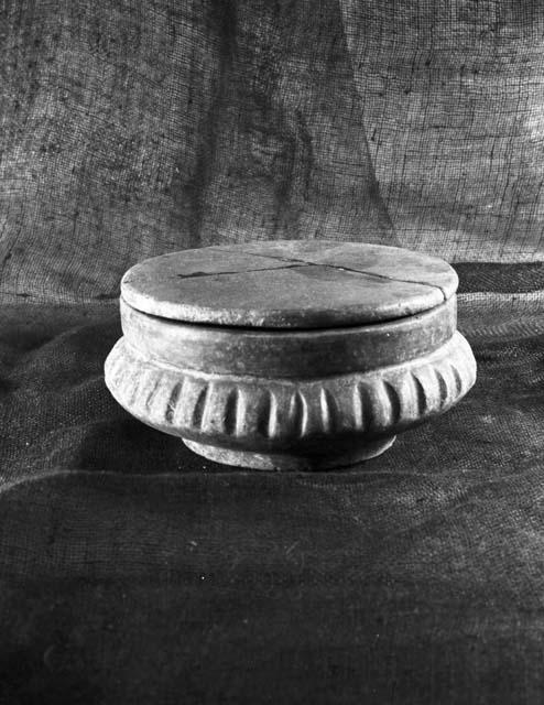 Red pot cover and red corrugated bowl with ring base, grave 31, number 36, 32