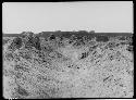 Narrow street between two central groups of ruins of Tschudi group, bearing northwest by southeast.