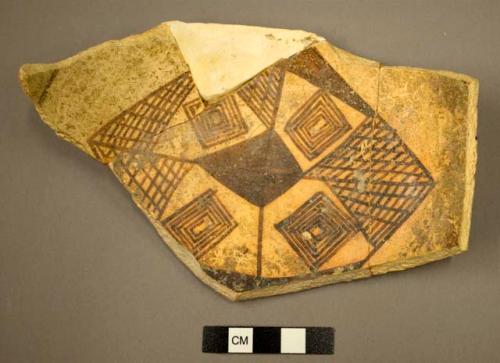 Restored Awatovi black-on-yellow potsherd