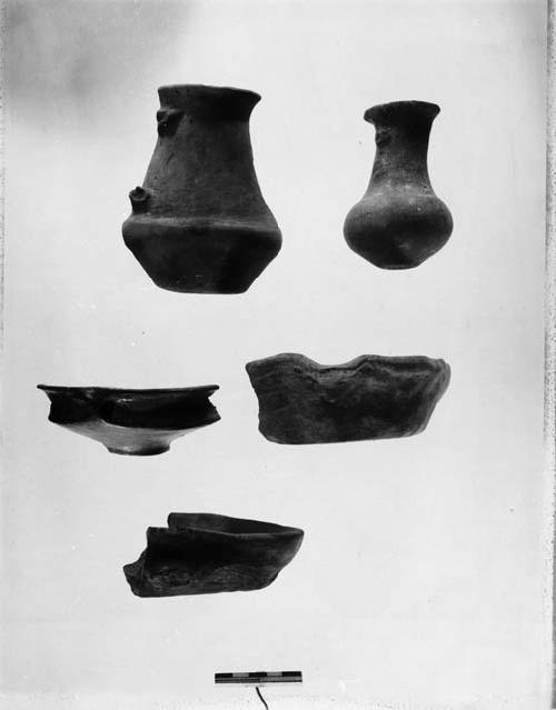 Three potsherds and two tall-necked vessels