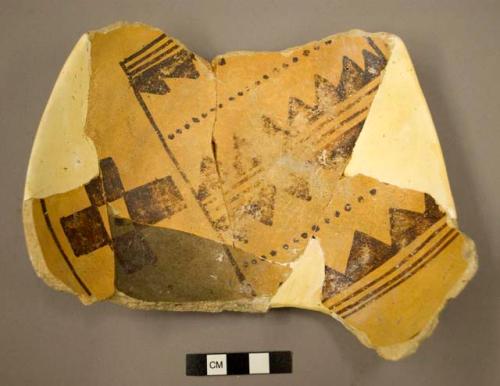 Restored Awatovi black-on-yellow potsherd