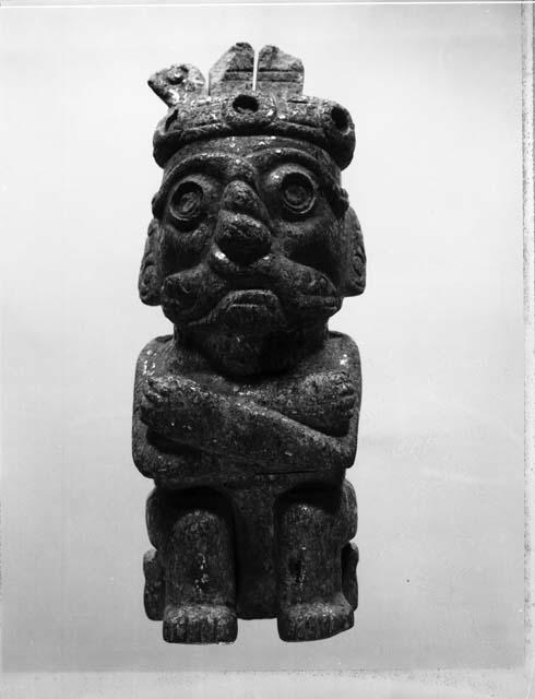 Seated male deity (stone)